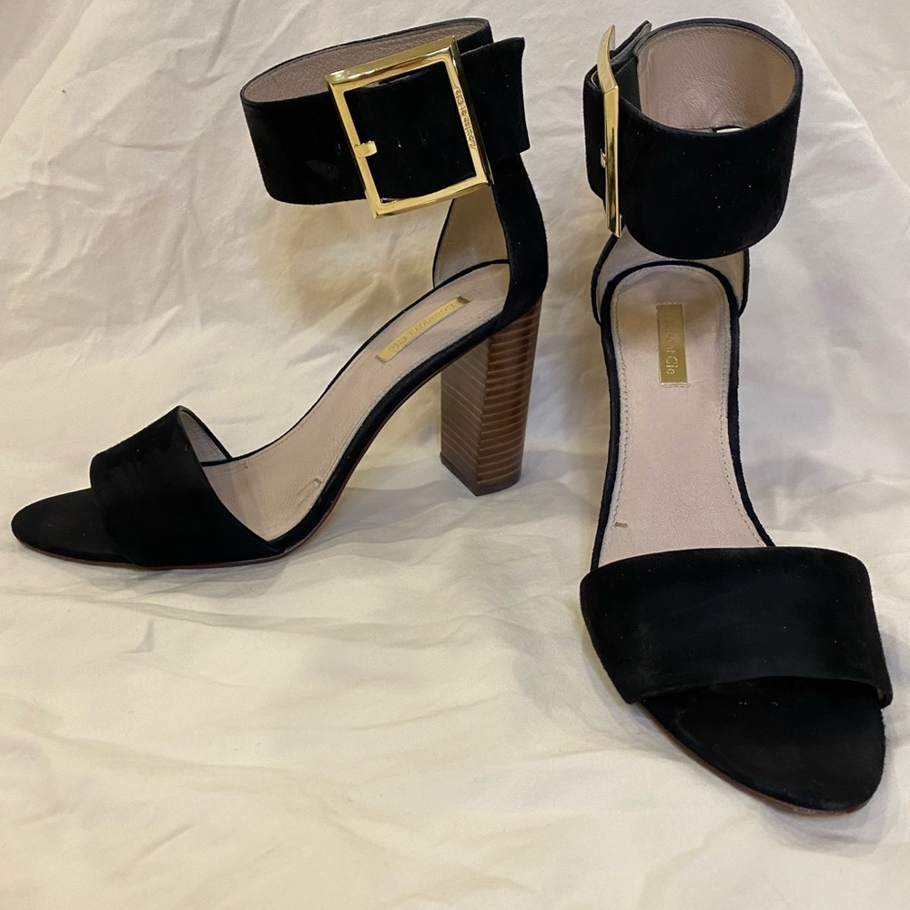 Ankle strap black heels.